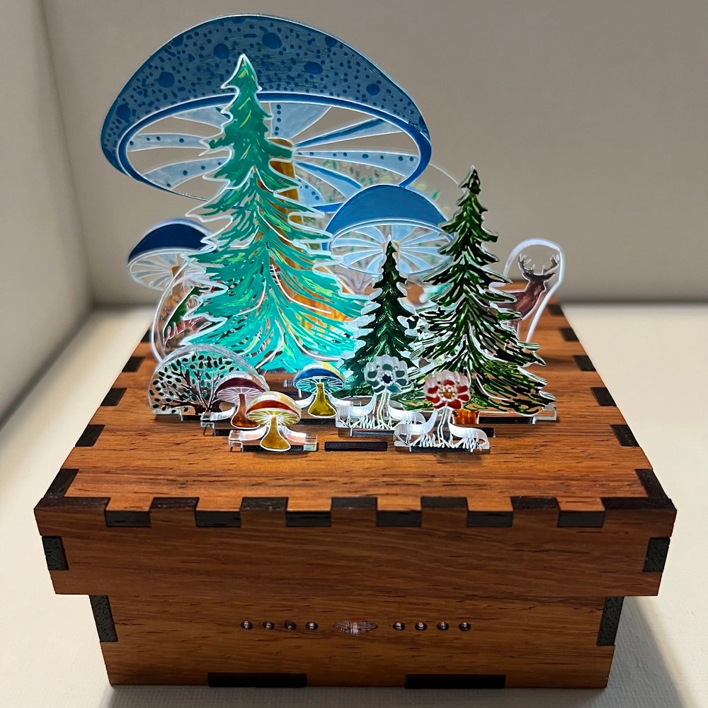 Fantastical forest scene with large mushrooms that tower over fir trees and many smaller plants. A deer peaks from within.